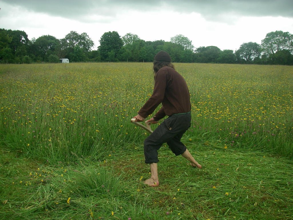 Phil bare foot mowing in the Top Field