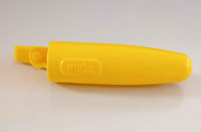 Yellow plastic stone holder