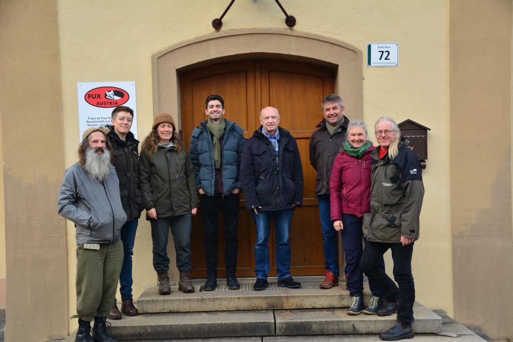 On the factory steps. Left to Right - Phil Batten, Jenny Nilsson, Michelle Lainè, Toni Baudinger, Mr Dietmar Baudinger, Klaus Perthmayr, Christiane Laganda and Mats Rosengren.